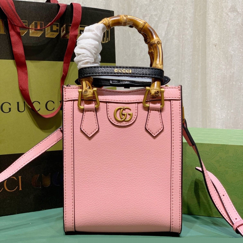 G*u*i top handle bags